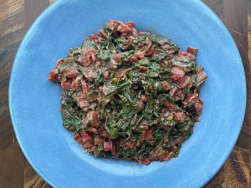 No-Cream Creamed Swiss Chard uses vegan butter substitute and unsweetened nondairy milk, such as oat milk. (Kellie Hynes for The Atlanta Journal-Constitution)