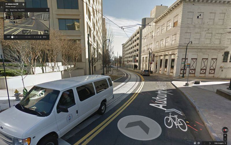 The Google Map Street View can be used as a street-level time machine. In the street view, click a clock icon in the upper left box and see what other views from the same location are available from previous years. Here, a view of the new streetcar lines along Woodruff Park are contrasted with an earlier view of the street before the tracks were put in. (Google Maps)
