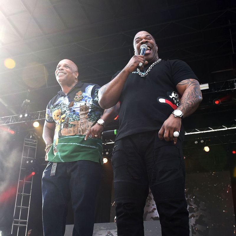 Rapper Busta Rhymes (right) and hype man Spliff Star perform at One Musicfest Saturday. One Musicfest is celebrating its 10th anniversary at Centennial Park. Day one kicked off with headliners Gucci Mane and Academy Award winners Three 6 Mafia. RYON HORNE/RHORNE@AJC.COM