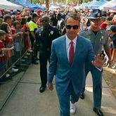 Mississippi head coach Lane Kiffin waves to fans during the Walk of Champions in the Grove before an NCAA college football game against Georgia Tech in Oxford, Miss., Saturday, Sept. 16, 2023. (AP Photo/Thomas Graning)