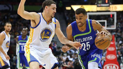 Atlanta Hawks Thabo Sefolosha drives against Golden State Warriors Klay Thompson during the first period in a NBA basketball game on Monday, March 6, 2017, in Atlanta. Curtis Compton/ccompton@ajc.com