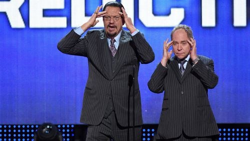 LAS VEGAS, NV - JUNE 22:  Penn Jillette (L) and Teller of the comedy/magic team Penn & Teller perform during the 2016 NHL Awards at The Joint inside the Hard Rock Hotel & Casino on June 22, 2016 in Las Vegas, Nevada.  (Photo by Ethan Miller/Getty Images)