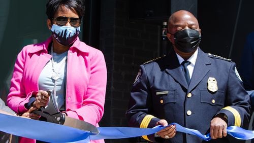 (Left to right)  Mayor of Atlanta Keisha Lance Bottoms and Interim Chief Rodney Bryant of the Atlanta Police Department cut the ribbon for the new At-Promise Center on Thursday, April 1, 2021, in the Pittsburgh community in Atlanta. The At-Promise Center will serve as a youth crime diversion and prevention center. CHRISTINA MATACOTTA FOR THE ATLANTA JOURNAL-CONSTITUTION.
