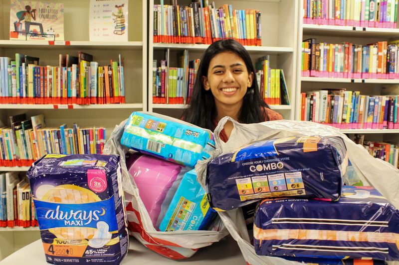 Deeksha is seen delivering period products to the Global Village Project, a school for refugee girls in Clarkston, GA. (Photo Courtesy of Deeksha Khanna)