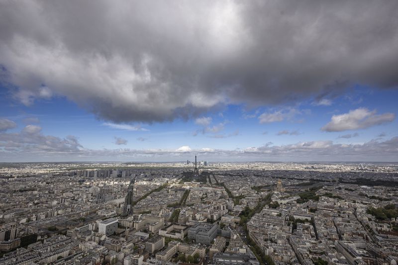Paris city, with the Eiffel Tower at center, are pictured Monday, April 15, 2024 in Paris. (AP Photo/Aurelien Morissard)