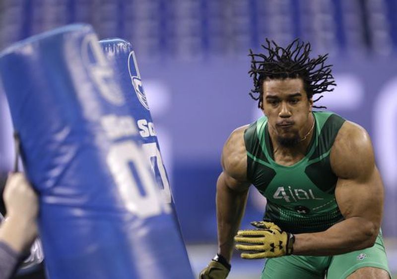 Clemson defensive lineman Vic Beasley runs a drill at the NFL football scouting combine in Indianapolis, Sunday, Feb. 22, 2015. (AP Photo/David J. Phillip)