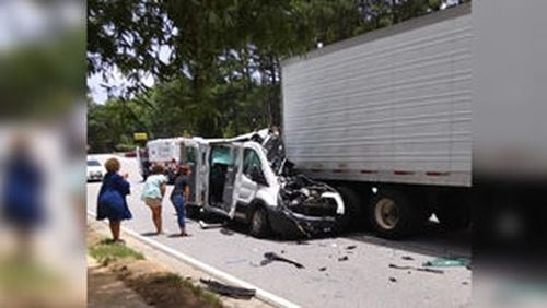 Two people were killed Monday afternoon when a van collided with a tractor-trailer in Union City.