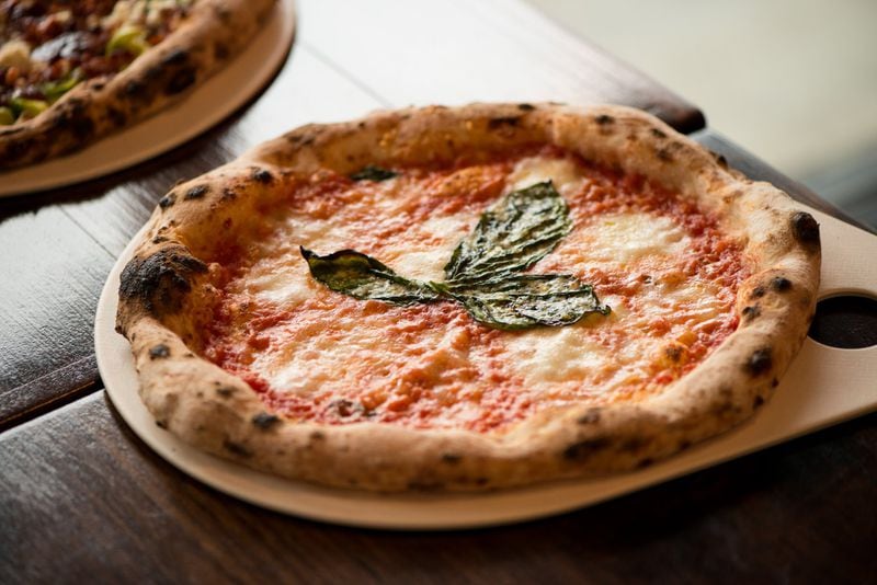  Margherita Pizza with San Marzano tomatoes, fresh mozzarella, basil, olive oil, and Grana Padano Parmesan. Photo credit- Mia Yakel.