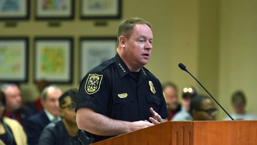 Chief of Police James Conroy stands before commissioners during DeKalb County Commission meeting last week. Commissioners asked county police to compile crime statistics surrounding late-night bars before reducing their hours. HYOSUB SHIN / HSHIN@AJC.COM