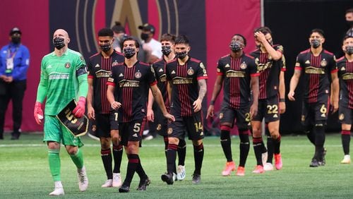 Atlanta United players enter the pitch. (AJC)