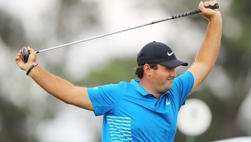 Yeah, Patrick Reed is still loose, as he proves at the start of Saturday's Masters round. (Curtis Compton/ccompton@ajc.com)