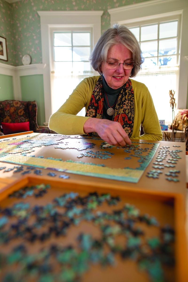 Daiga Dunis of Decatur said the puzzles allow her to disconnect and focus on relaxing. (Courtesy of Isadora Pennington)