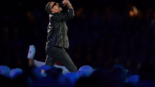 George Michael performs during the Closing Ceremony on Day 16 of the London 2012 Olympic Games at Olympic Stadium on August 12, 2012 in London, England. (Photo by Jeff J Mitchell/Getty Images)