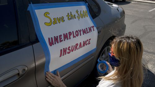 The emergency payments of $600 a week to jobless worker were credited with keeping households and consumer spending afloat. But the payments ended in July. Georgia officials say they plan to start paying half that amount as part of a program using money from the budget of the Federal Emergency Management Agency. (Bridget Bennett/AFP via Getty Images/TNS)