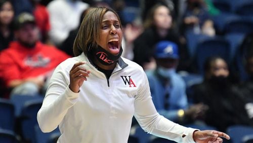March 10, 2022 Macon - Woodward Academy's head coach Kim Lawrence shouts instructions during the 2022 GHSA State Basketball Class AAAAA Girls Championship game at the Macon Centreplex in Macon on Thursday, March 10, 2022. Woodward Academy won 72-44 over Forest Park. (Hyosub Shin / Hyosub.Shin@ajc.com)