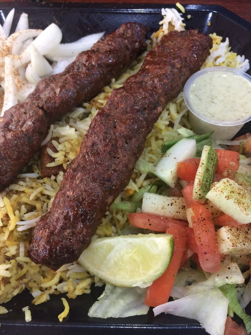 Kabab Express’ beef seekh kebabs are stellar and a terrific bargain at $6.99 for a platter with rice, salad and traditional accompaniments. CONTRIBUTED BY WENDELL BROCK