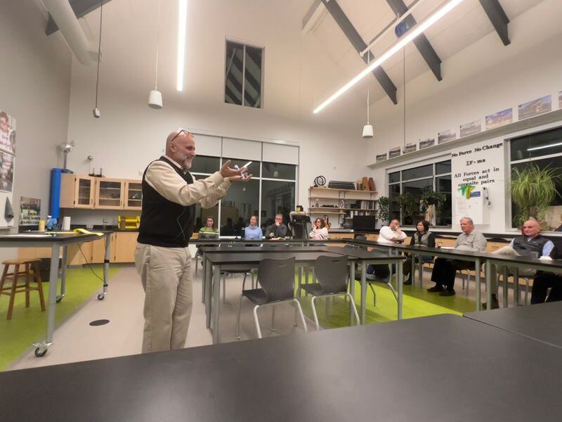 Savannah Country Day School physics teacher, Adam Weber, engages adults during a previous Faculty Exploration series presentation. Weber has been the force behind the Faculty Exploration series since its inception in 2019.