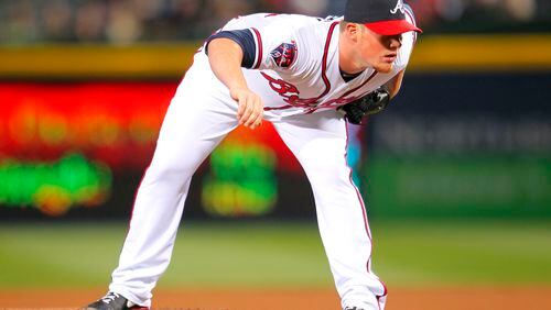 Atlanta Braves relief pitcher Craig Kimbrel prepares to wind up and deliver in the ninth inning of the baseball game against the New York Mets, Wednesday, April 9, 2014, in Atlanta. The Braves won the game 4-3. (AP Photo/Todd Kirkland)
