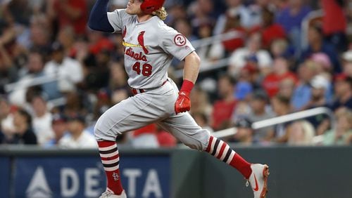 Harrison Bader  of the St. Louis Cardinals gestures after hitting a 3-run home run in the eighth inning during the game against the Atlanta Braves at SunTrust Park on September 17, 2018 .