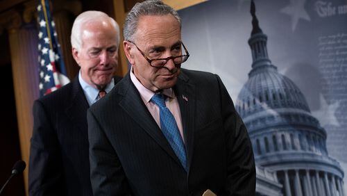 WASHINGTON, DC - MAY 17: L to R, Sen. John Cornyn (R-TX) and Sen. Chuck Schumer (D-NY) exit a news conference concerning the Justice Against Sponsors of Terrorism Act (JASTA), on Capitol Hill, May 17, 2016, in Washington, DC. On Tuesday, the Senate passed the Justice Against Sponsors of Terrorism Act (JASTA) bill. The bill would allow survivors and relatives of those killed in the Sept. 11 attacks to file lawsuits seeking damages against the government of Saudi Arabia. (Photo by Drew Angerer/Getty Images)