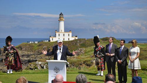 Presumptive Republican nominee for US president Donald Trump gives press conference on the 9th tee at his Trump Turnberry Resort surrounded by his family Eric Trump,Donald Trump junior and Ivanka Trump on June 24, 2016 in Ayr, Scotland. Mr Trump arrived to officially open his golf resort which has undergone an eight month refurbishment as part of an investment thought to be worth in the region of two hundred million pounds. (Photo by Jeff J Mitchell/Getty Images)