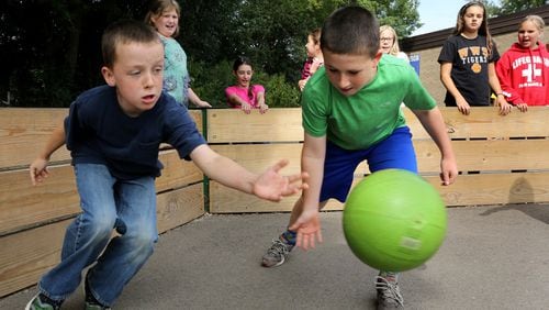 Madison Elementary School fifth graders play a game of gaga ball during recess in September 2015, in Wheaton, Ill. The game is a “kinder, gentler” version of dodgeball. (Antonio Perez/Chicago Tribune/TNS)