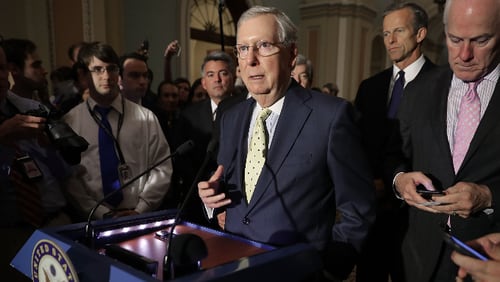 U.S. Senate Majority Leader Mitch McConnell (R-KY) (C) approaches the microphones at the U.S. Capitol June 20, 2017 in Washington, DC.