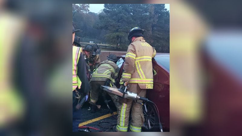 Crews rescue someone from a car following the crash near Panola Road. (Photo: DeKalb County Fire Rescue)