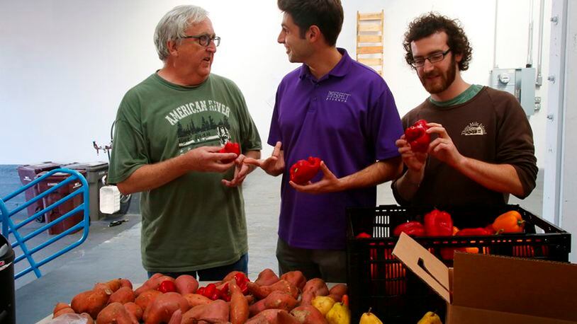 From left: Ron Clark, chief supply officer; Ben Simon, chief executive officer; and Ben Chesler, chief operating officer, in the warehouse of Imperfect Produce in Emeryville, Calif., Oct. 19, 2015. The start-up is looking to change minds about fruit and vegetables that are traditionally discarded before the store, part of a larger movement against food waste.