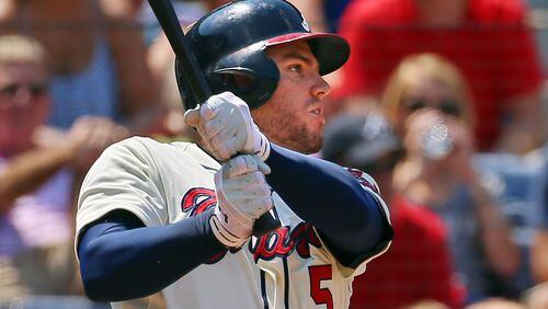 Freddie Freeman hits a 3-RBI home run for a 4-3 lead over the Marlins in the fifth inning.