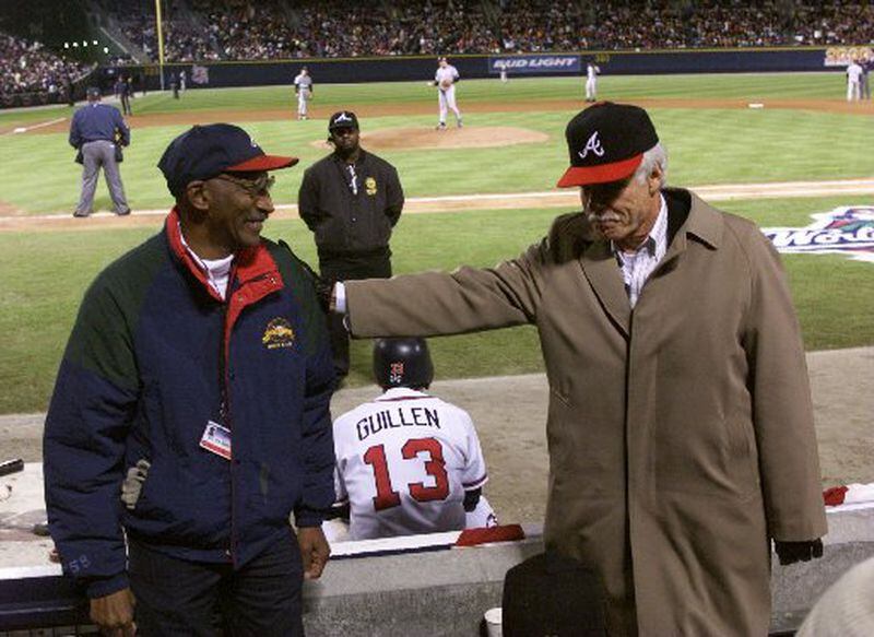 Walter Banks and Ted Turner at Turner Field. AJC file photo
