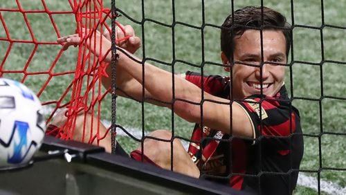 Atlanta United forward Erick Torres is all smiles with a face full of net after just missing a shot-on-goal against Cincinnati goalkeeper Spencer Richey Sunday, Nov. 1, 2020, at Mercedes-Benz Stadium in Atlanta. Atlanta United beat Cincinnati, 2-0. (Curtis Compton / Curtis.Compton@ajc.com)