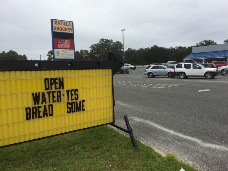 A sign in Atkinson in Brantley County spells out the water and bread situation.