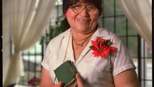 Thelma Grundy in with a small green leather Bible that she received as a gift and frequently carried with her. She and her family ran Thelma’s Kitchen, a landmark Atlanta restaurant serving soul food. JEAN SHIFRIN AJC staff