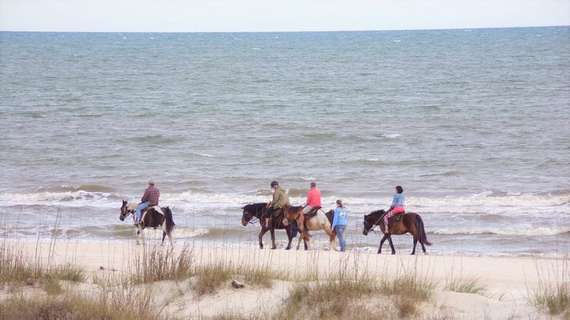 Horseback riding is common on the beach at Indian Pass, a rare uncrowded slice of Old Florida in the Panhandle.",
Courtesy of Blake Guthrie