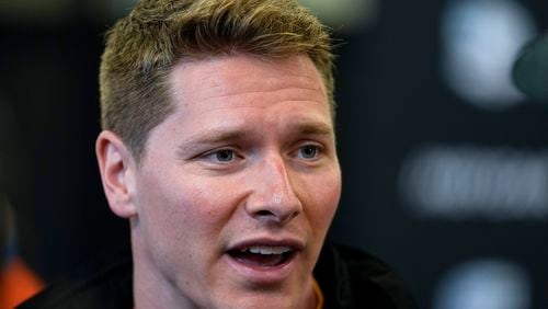 Josef Newgarden speaks during a news conference for the Indianapolis 500 auto race at Indianapolis Motor Speedway, Tuesday, May 14, 2024, in Indianapolis. (AP Photo/Darron Cummings)