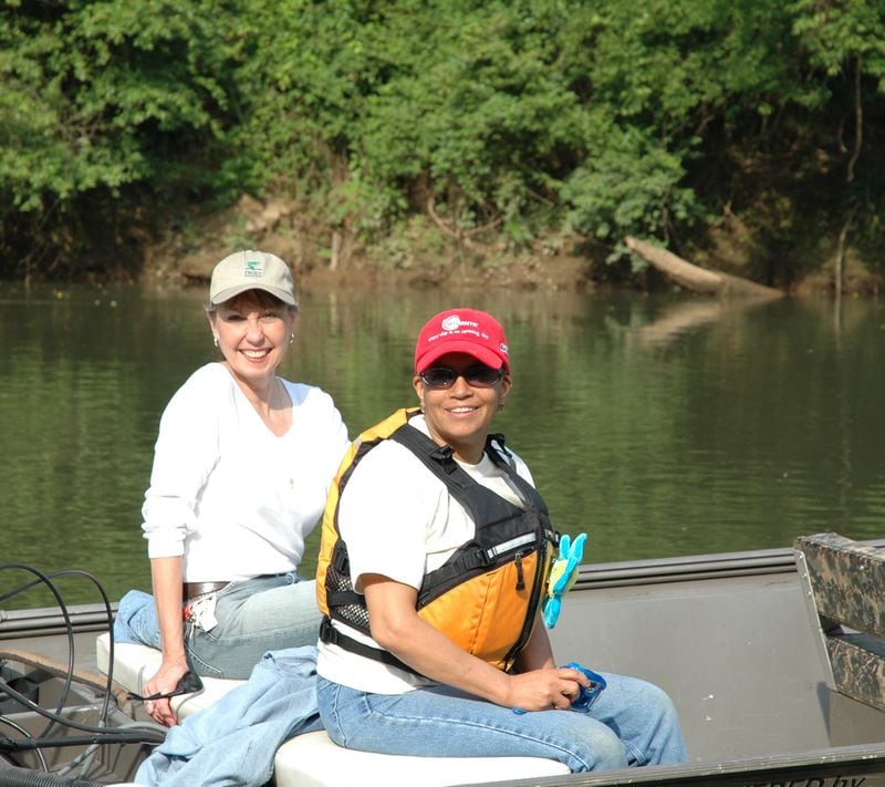 In a still from the documentary film "Saving the Chattahochee," Sally Bethea (left) and former Mayor Shirley Franklin go boating on the restored river. Photo: "Saving the Chattahoochee"
