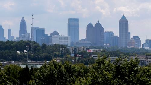 Nearly half of the state’s growth happened in the four largest Atlanta-area counties – Cobb, DeKalb, Fulton and Gwinnett. They grew by nearly a half a million people. The skyline of downtown Atlanta is visible near Lindbergh on Thursday, Aug. 12, 2021. (Christine Tannous / christine.tannous@ajc.com)