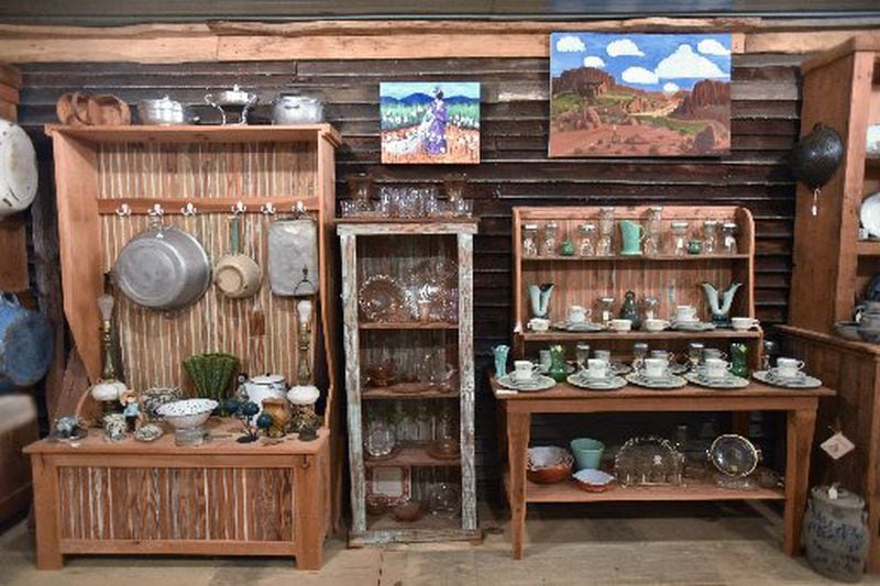 Rickey Maxey's hand-made furniture displays collectibles for sale at Maxey Folk Art. HYOSUB SHIN / HSHIN@AJC.COM