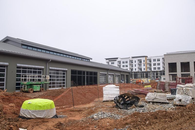 Construction is underway outside a food hall at the Halcyon mixed-use development in Forsyth County on February 11, 2019. 