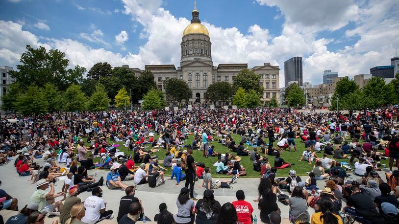 Hundreds of participants of the "OneRace Movement" listen to leaders inside Liberty Plaza, across the street form the Georgia State Capitol building, as they call for a biblical response of justice in Atlanta, Friday, June 19, 2020. The group marched from Centennial Olympic Park to the State Capitol building.
