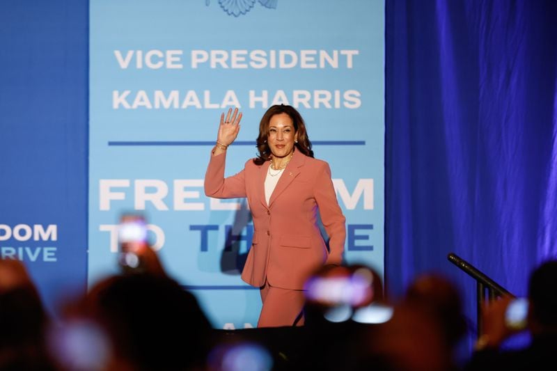 Vice President Kamala Harris walks onstage at an event Monday at the Georgia International Convention Center to kick off her economic tour focusing on improving opportunities for Black men. (Natrice Miller/ AJC)