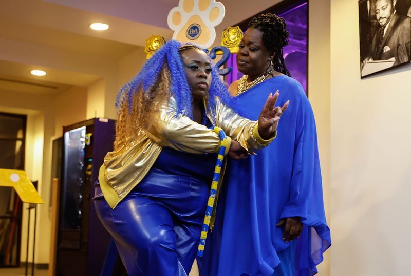 Versha Patrick (right), a member of Morris Brown College’s last line of  Sigma Gamma Rho Sorority Inc. stands next to Amaris Johnson as she comes out as newest member on Friday, March 22, 2024. The sorority will be the first on campus in more than 20 years. (Natrice Miller/ Natrice.miller@ajc.com)