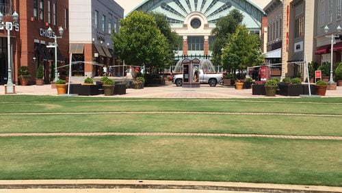 Patrons of surrounding restaurants could bring their alcoholic beverage to an outdoor movie or concert at the mall's amphitheater
