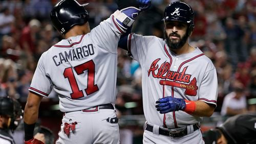 The emergence of rookie Johan Camargo was part of the reason that Sean Rodriguez (right) became expendable to the Braves, who traded him Saturday to the Pirates for a first base/outfield prospect. (AP Photo/Matt York)