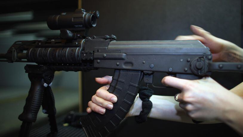 A weapon is used on the indoor firing range at the National Armory gun store in Pompano Beach, Florida. The Florida Senate passed a school safety bill Monday, which now goes to the Florida House after a shooting at a Parkland high school left 17 dead.