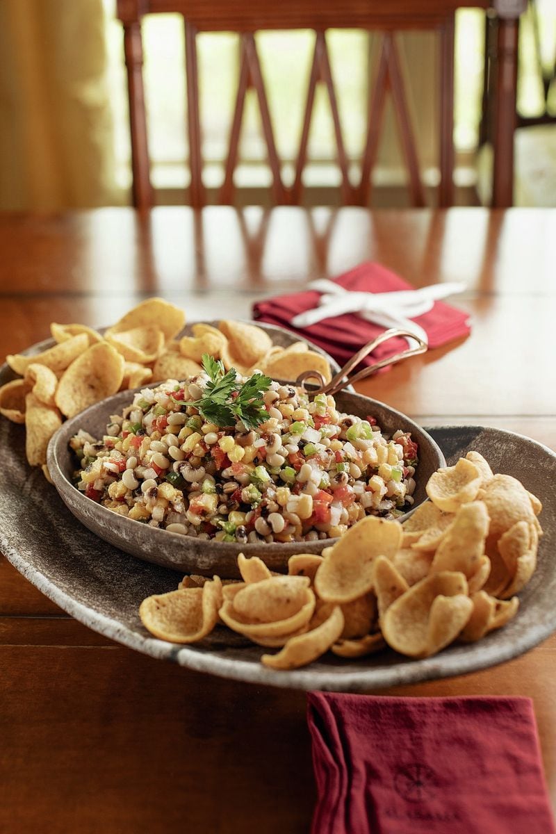 The recipe for Carolina Caviar comes from the new cookbook “Southern Snacks” by Perre Coleman Magness. You’ll want to serve it with big scooping corn chips. CONTRIBUTED BY JUSTIN FOX BURKS / STYLING BY JENNIFER CHANDLER