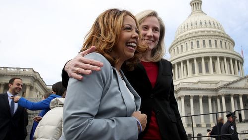 Congresswomen-elect Lucy McBath, D-Ga., (left) and  Abigail Spanberger, D-Va., meet in front of the U.S. Capitol following an official class picture of new representatives on November 14, 2018 in Washington, D.C.  (Photo by Win McNamee/Getty Images)