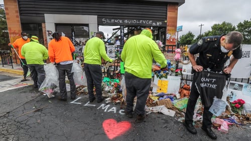 . Atlanta police and sanitation crews finished removing protesters and their belongings from outside the Wendyâ€™s on Monday July 6, 2020 where Rayshard Brooks was shot and killed by an officer last month. The last concrete barricade was put in place around noon. Some of the protesters milled nearby while a worker from the BP gas station next door pulled boards off the windows. Mondayâ€™s cleanup followed a violent holiday weekend that started Saturday night when 8-year-old Secoriea Turner was fatally shot while sitting in a car near the restaurant. Atlanta Mayor Keisha Lance Bottoms denounced the violence in an emotional press conference at police headquarters in which she and Turnerâ€™s family urged people to come forward with information about the girlâ€™s killers. About 9:30 a.m. Monday, uniformed officers and multiple workers in neon attire tossed flowers and other items from a makeshift memorial outside the Wendyâ€™s into garbage bags. The site has served as ground zero for protests since Brooks was shot in the parking lot following an attempted DUI arrest in the drive-thru line June 12. The restaurant was destroyed during a large protest the next day. Three people have been arrested on arson charges in connection with the incident. JOHN SPINK/JSPINK@AJC.COM