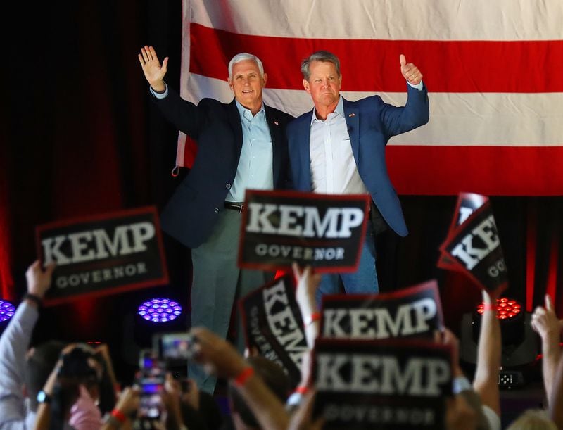 Former Vice President Mike Pence, shown campaigning in May with Gov. Brian Kemp, will return to Georgia in October. He'll participate in two fundraisers on Oct. 13 to benefit four candidates, including one that will raise cash for state Sen. Burt Jones, whose bid for lieutenant governor was endorsed by former President Donald Trump. Curtis Compton / Curtis.Compton@ajc.com”